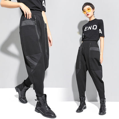 Tapered foot pants with zipper stitching pockets