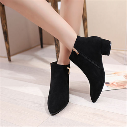 Pointed toe and low heel boots