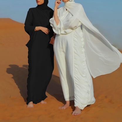 فستان طويل بلون سادة وربطة عنق منسدلة في الشرق الأوسط بدبي