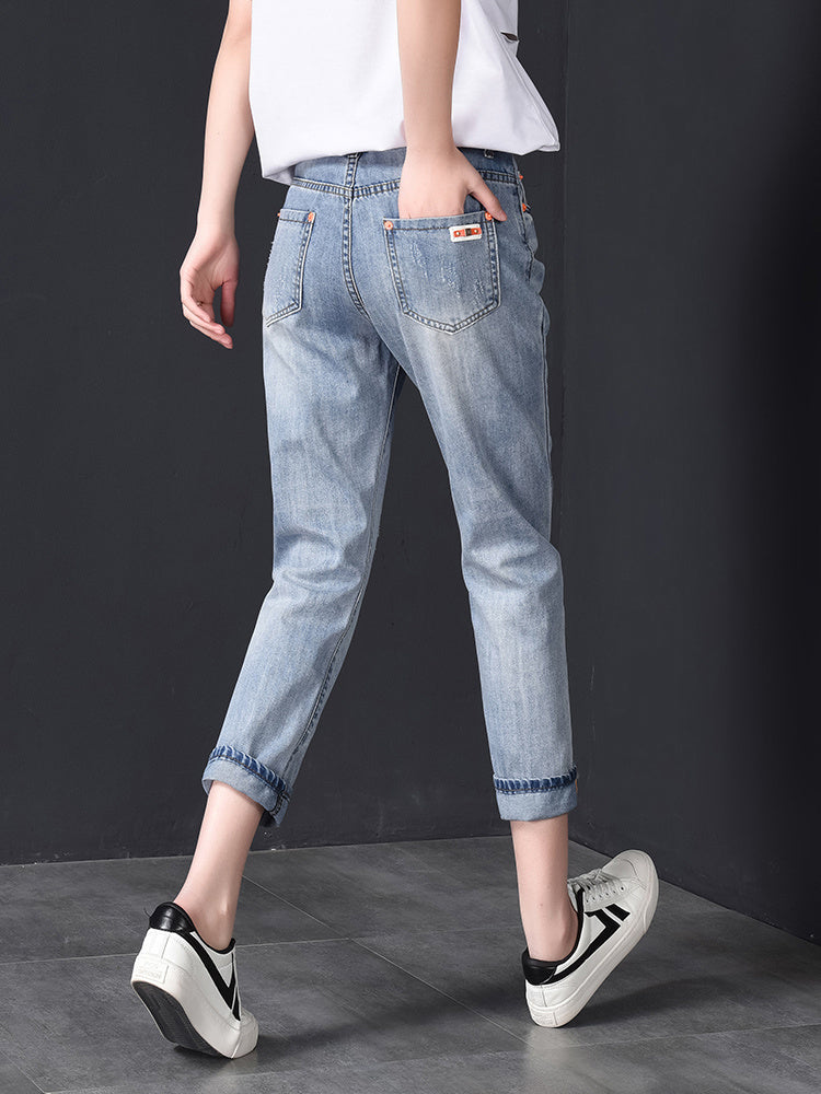 بنطال جينز ممزق ذو تسع نقاط مستقيمة الساق من هارلان عالي الخصر